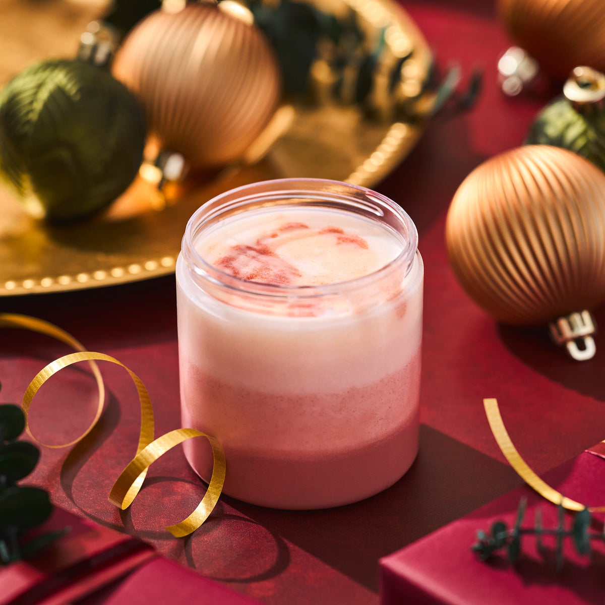toasted marshmallow sugar scrub on a holiday background